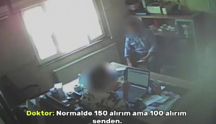 Para karşılığı rapor yazan doktoru kameralar yakaladı