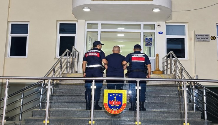 Dikili'de 27 yıl 7 ay hapis cezasıyla aranan şahıs yakalandı