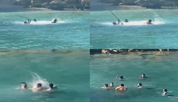 Mersin'de denizin ortasında sopalı kavga kamerada